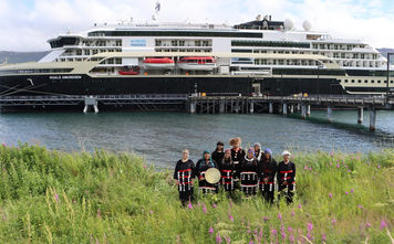 Alutiiq dancers welcome MS Roald Amundsen to Old Harbor, Alaska
