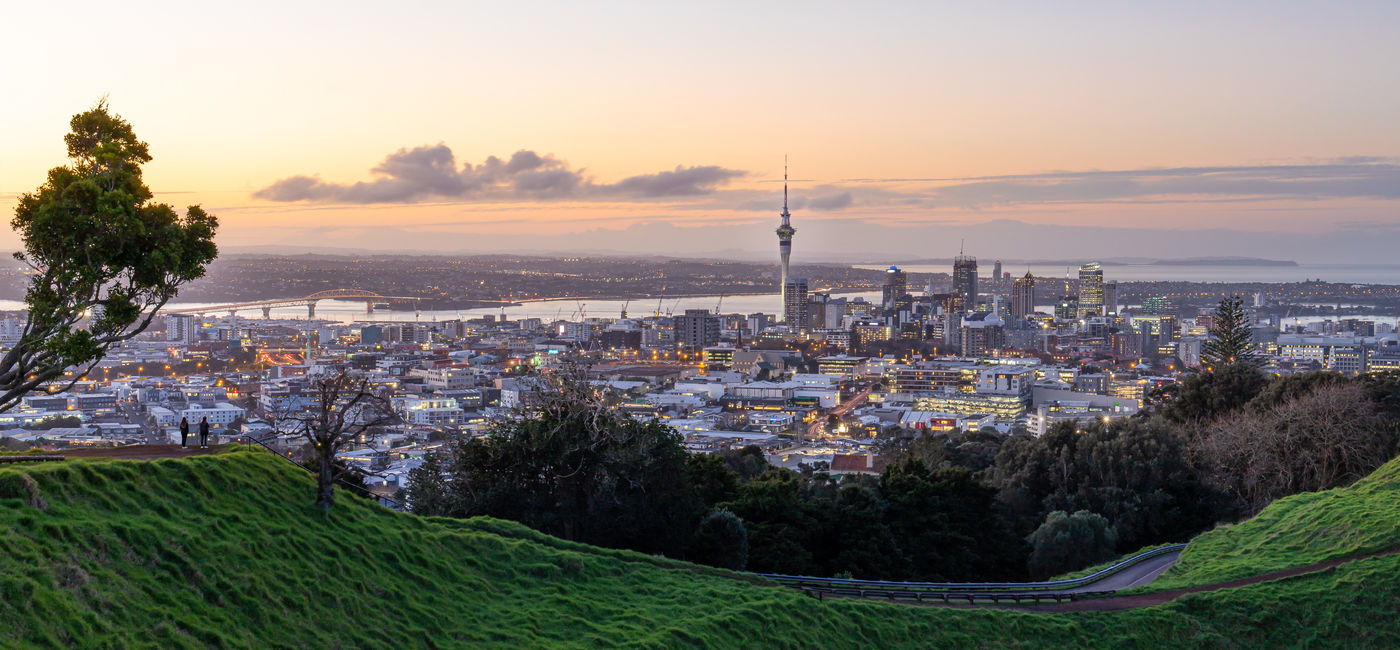 Image: Sunset over Auckland, New Zealand. (Photo Credit: Worawat/Adobe)