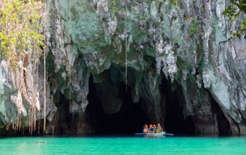 In the Philippines, travelers can cruise through Puerto Princesa’s famed subterranean river.