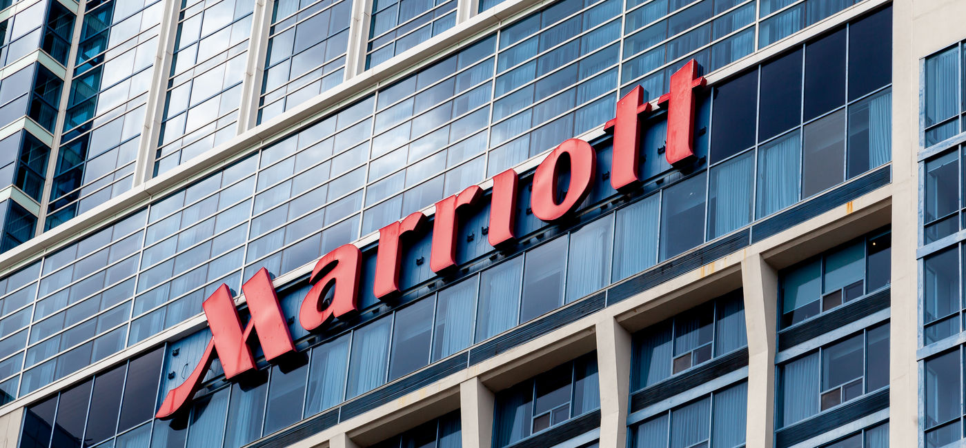Image: Marriott logo on hotel. (Photo Credit: JHVEPhoto - stock.adobe.com)