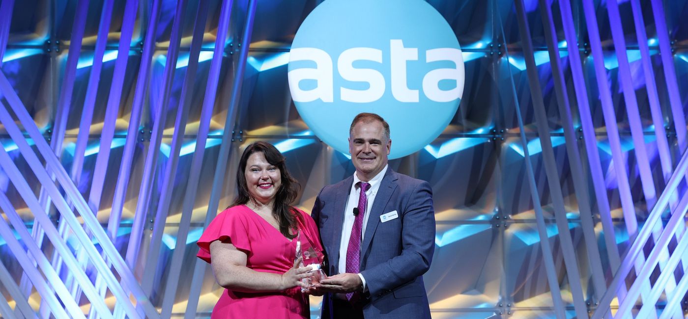 Image: Velia Kennedy accepting the 2024 ASTA Travel Advisor of the Year award from ASTA President and CEO Zain Kerby. (Photo Credit: ASTA)