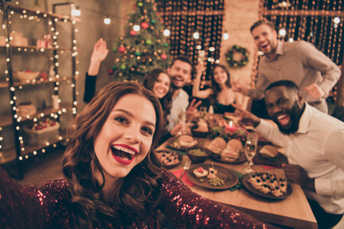 A group of friends celebrating during a holiday gathering.