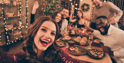 A group of friends celebrating during a holiday gathering.