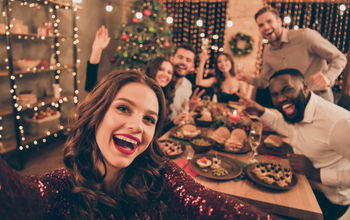 A group of friends celebrating during a holiday gathering.