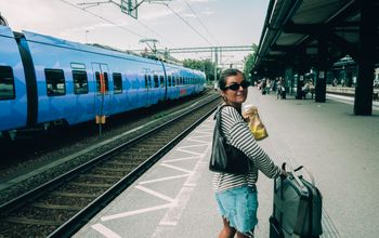 Interrail traveler on train platform, Interrail, Europe
