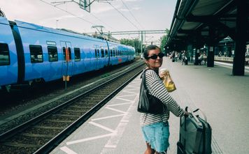 Interrail traveler on train platform, Interrail, Europe