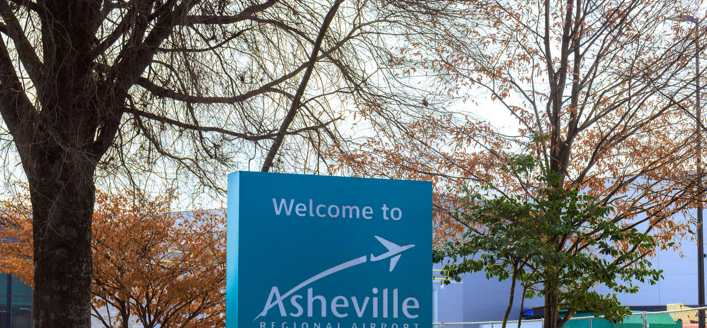 Image: Welcome sign at Asheville Regional Airport in North Carolina. (Photo Credit: Adobe/ungvar)