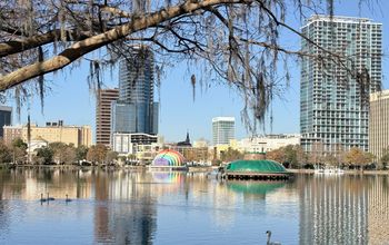 A walking path surrounds Lake Eola in downtown Orlando.