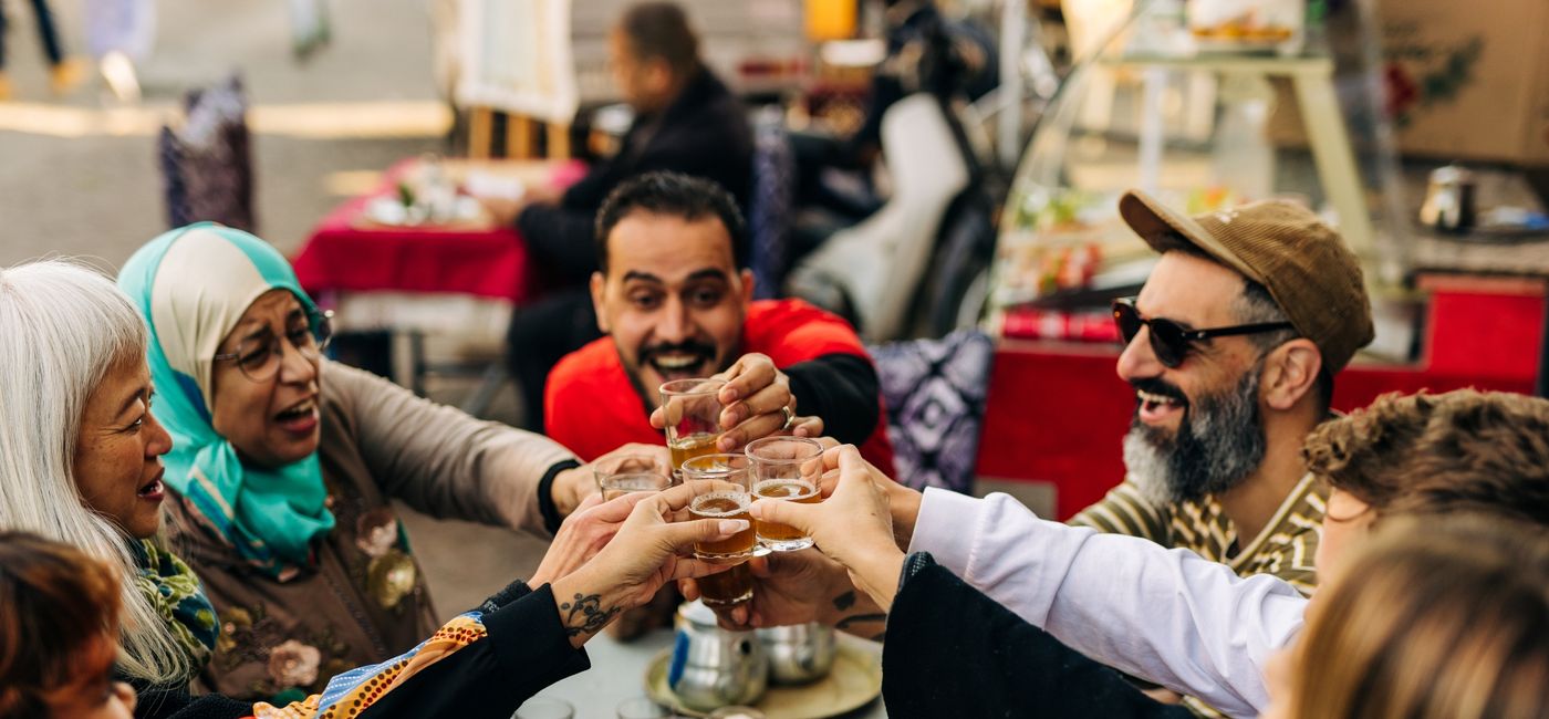 Image: An Intrepid Travel group drinks tea in Marrakech, Morocco. (Photo Credit: Intrepid Travel)