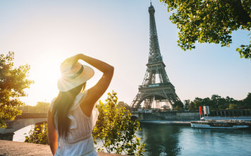 Tourist enjoying the Eiffel Tower in Paris, France