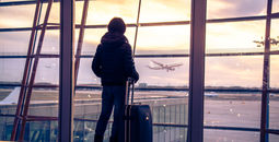 Passenger at airport in Beijing, China.