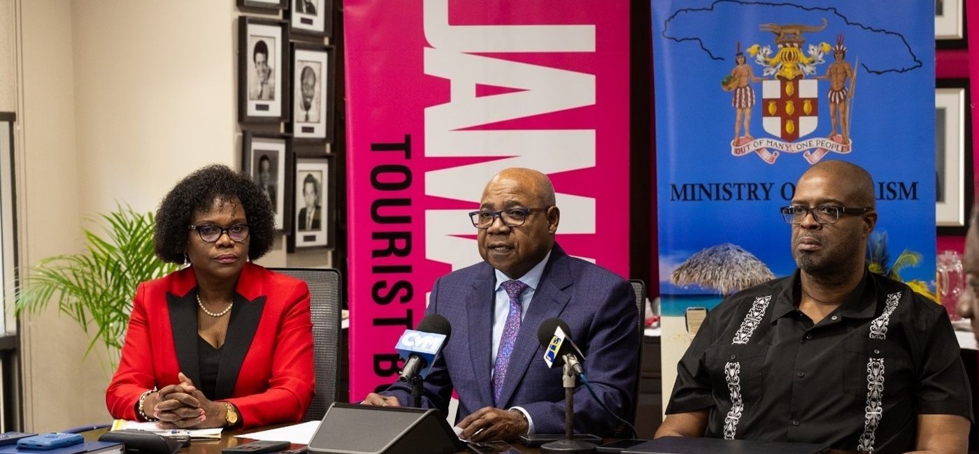 Image: Edmund Bartlett (center), with Jennifer Griffith (left), permanent secretary in the Ministry of Tourism, and professor Lloyd Waller, executive director of the Global Tourism Resilience and Crisis Management Centre. (Photo Credit: Jamaica Tourist Board)