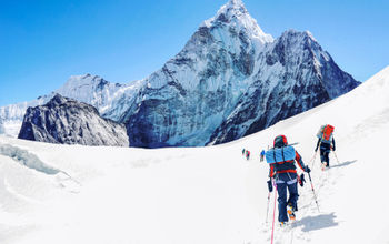 Group of climbers reaching the Everest summit in Nepal