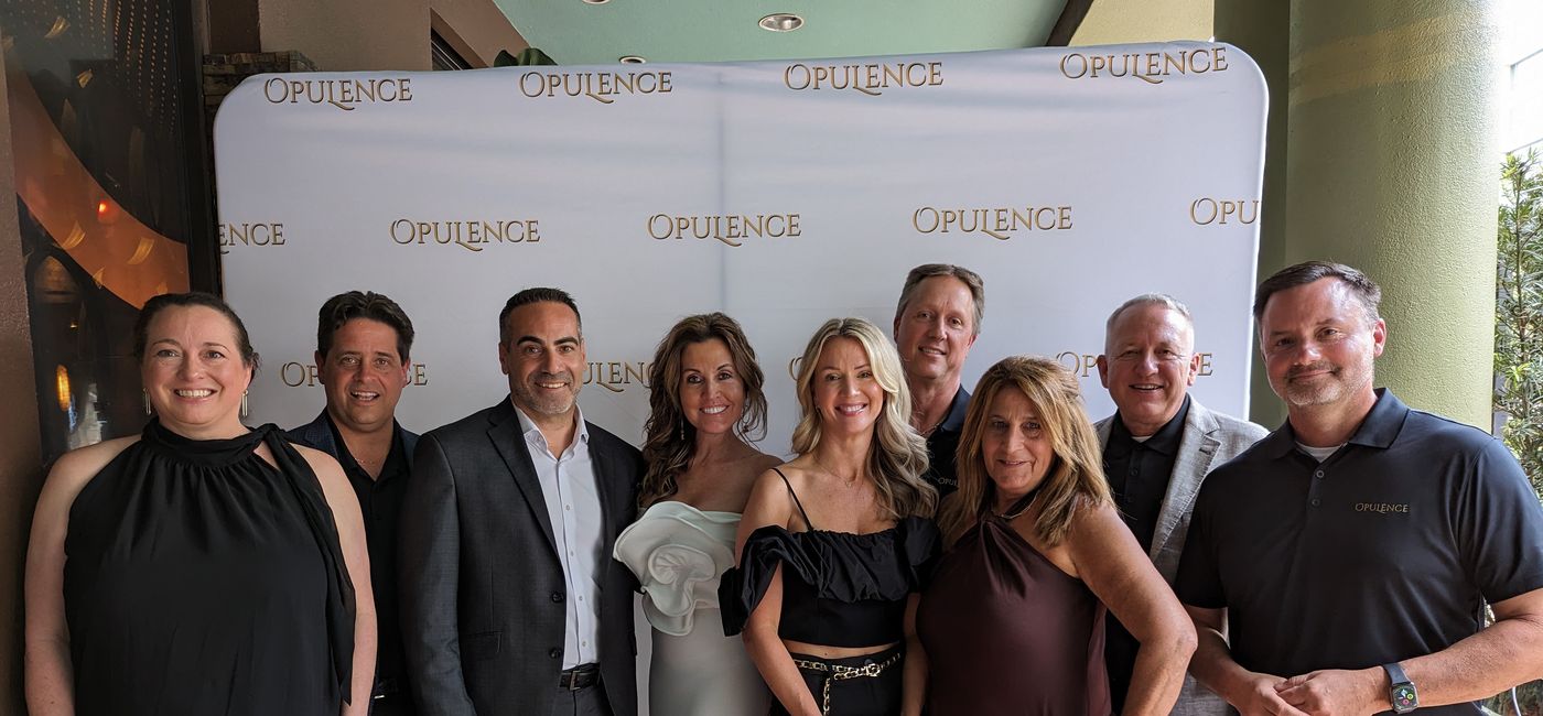 Image: Outside Agents team celebrates the launch of new luxury brand Opulence. (Photo Credit: Eric Bowman)
