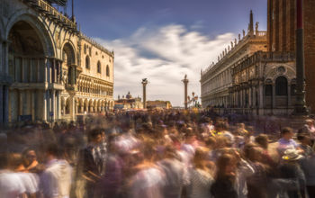 Crowds of tourists in St. Mark's Square, Venice, Italy.