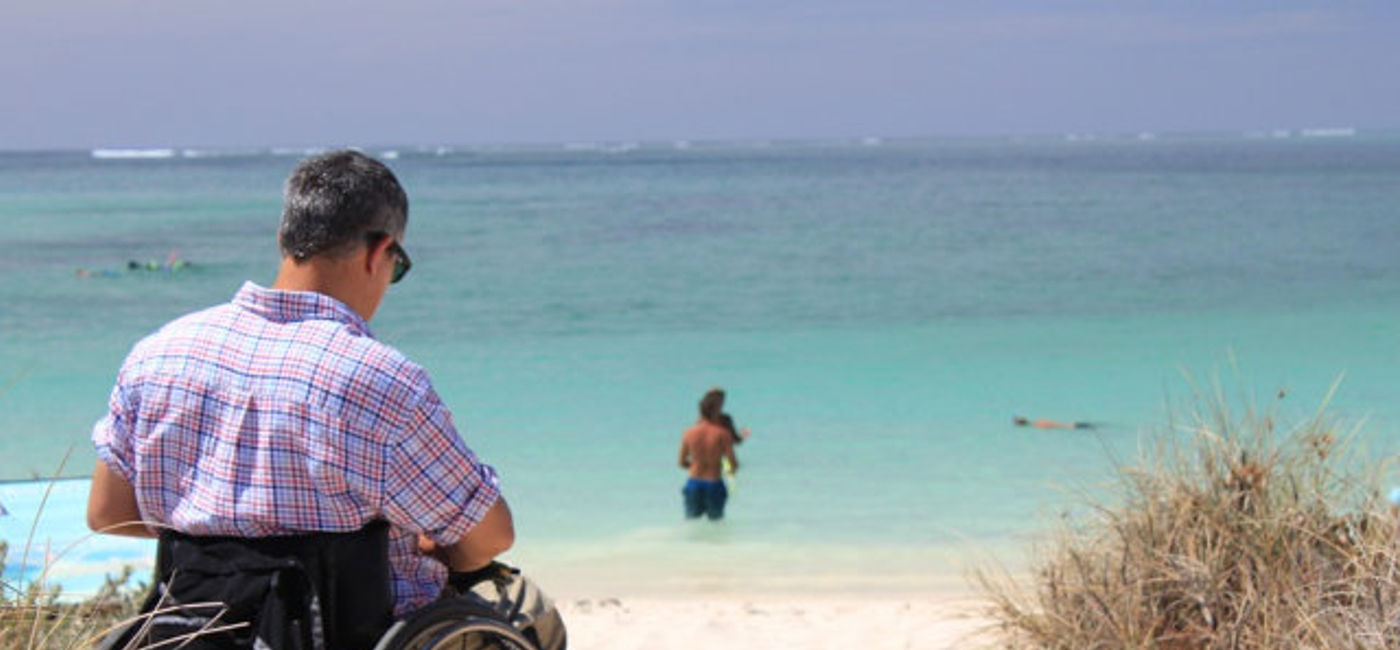 Image: PHOTO: Wheelchair on the beach. (photo via Pixabay/Lonely Taws)