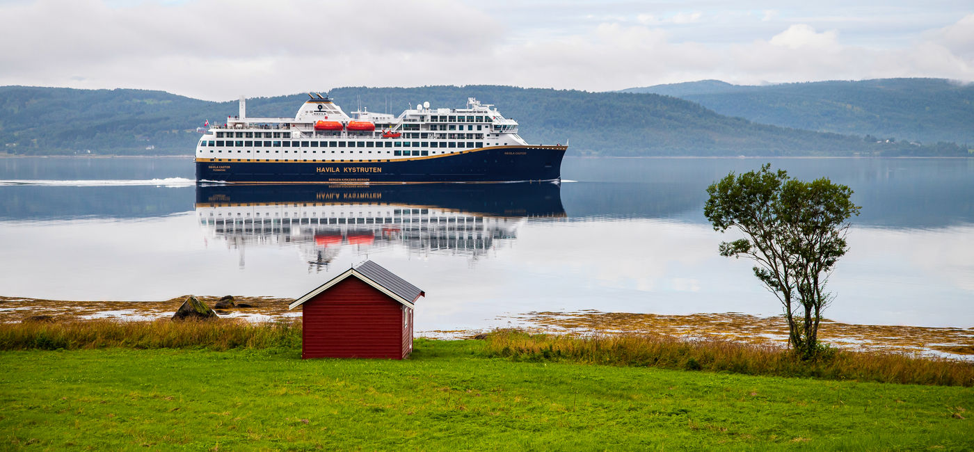 Image: The Havila Kystruten ship sails through Norway. (Photo Credit: ©Ronny M. Olsen) Havila Voyages Current Offer