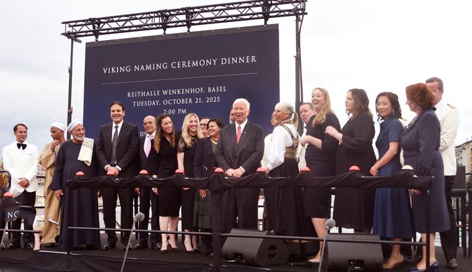 Viking christening stage filled with Godmothers and Godfathers.