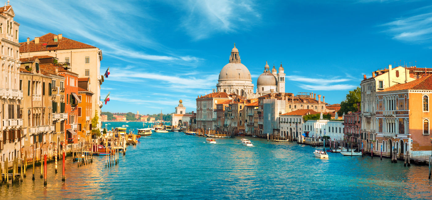 Image: The Grand Canal in Venice, Italy. (Photo Credit: Adobe Stock/gurgenb)