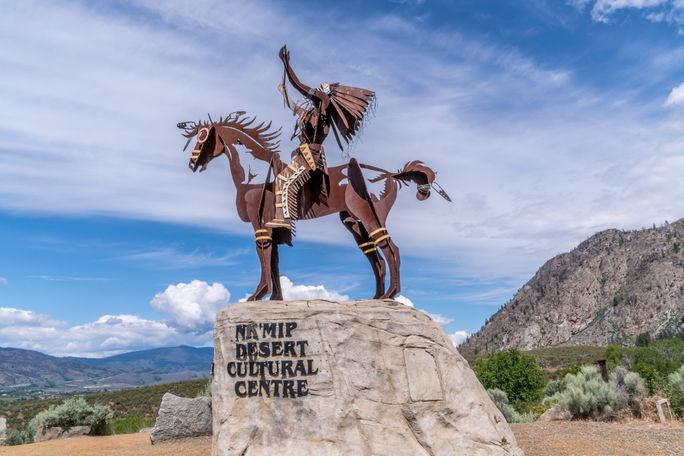 The Chief at entrance to Nk'Mip Cultural Centre and Spirit Ridge