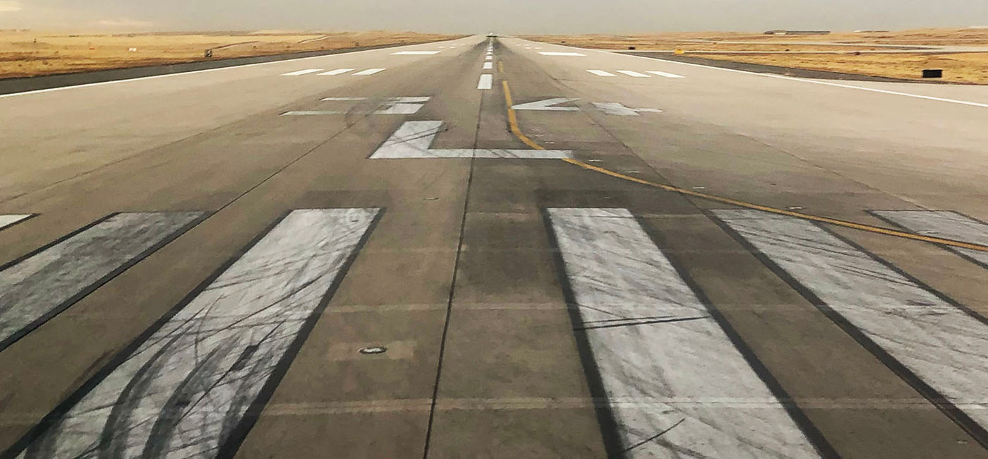 Image: Runway at Denver International Airport. (Photo Credit: Photo by Paul J. Heney.)