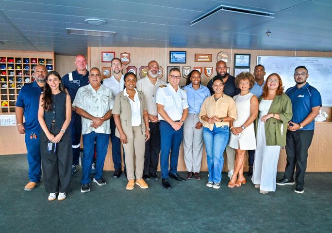 Marie McKenzie joins Carnival executives, ship officers and government and tourism sector representatives from Bonaire aboard Carnival Horizon during a visit. Carnival Corporation & plc, marie mckenzie, carnival horizon, carnival cruise line execs, carnival corp people