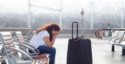A jet lagged traveler at the airport
