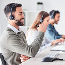 Customer support team members working in a call center.