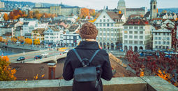 Traveler backpacking through Zurich, Switzerland