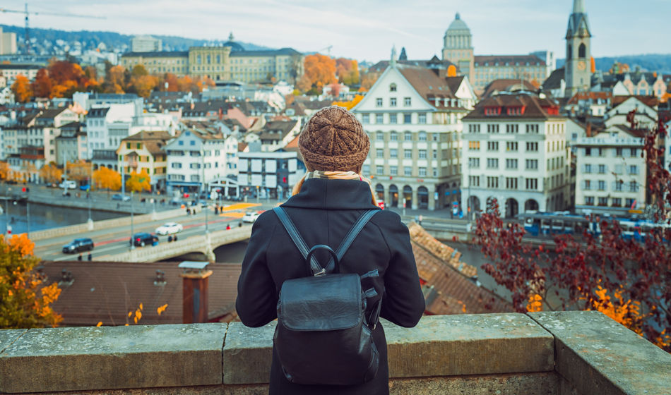 Traveler backpacking through Zurich, Switzerland