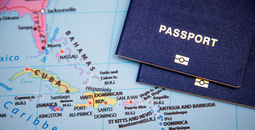 Passports on a map of the Caribbean region.
