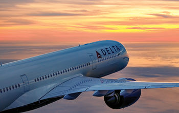 Delta Air Lines plane at sunset.