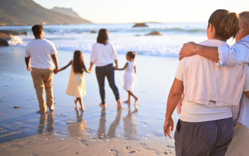 Large family enjoying the beach