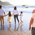 Large family enjoying the beach