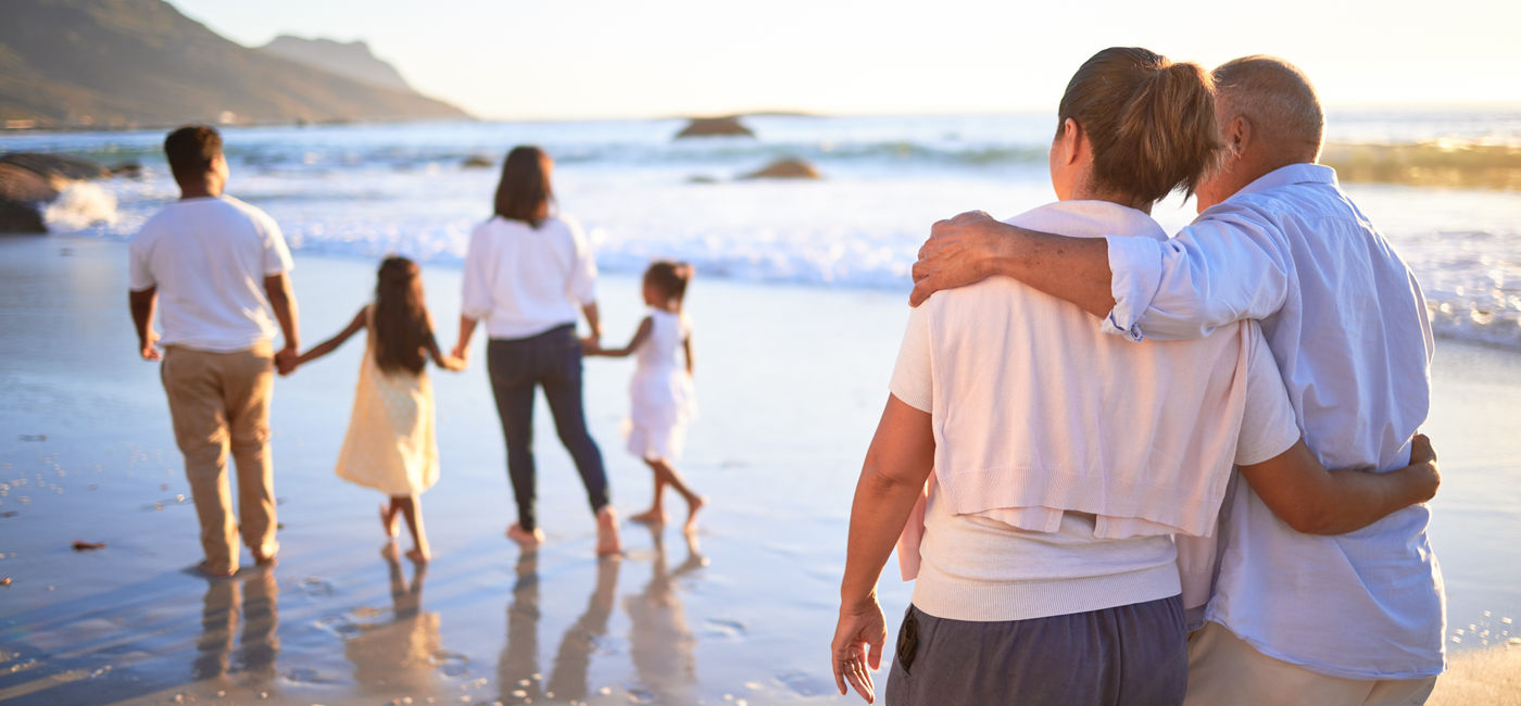 Image: Large family enjoying the beach. 