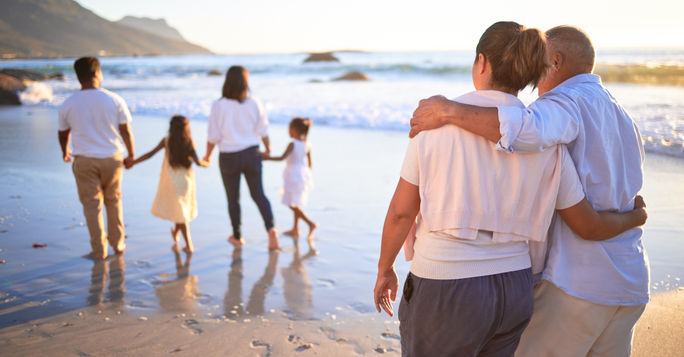 Large family enjoying the beach