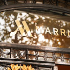 Marriott logo on a hotel facade in Paris, France.