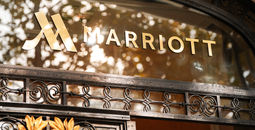 Marriott logo on a hotel facade in Paris, France.