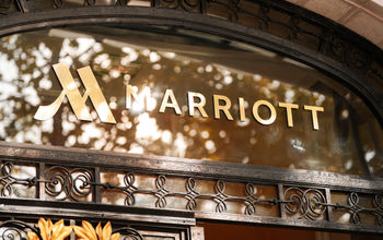 Marriott logo on a hotel facade in Paris, France.