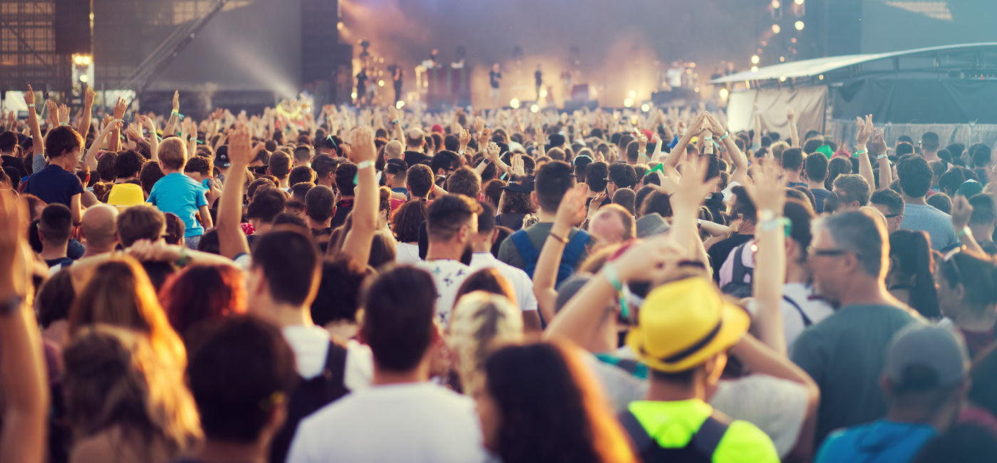 Image: Summer concert crowd. (Photo Credit: 2207918/Adobe)