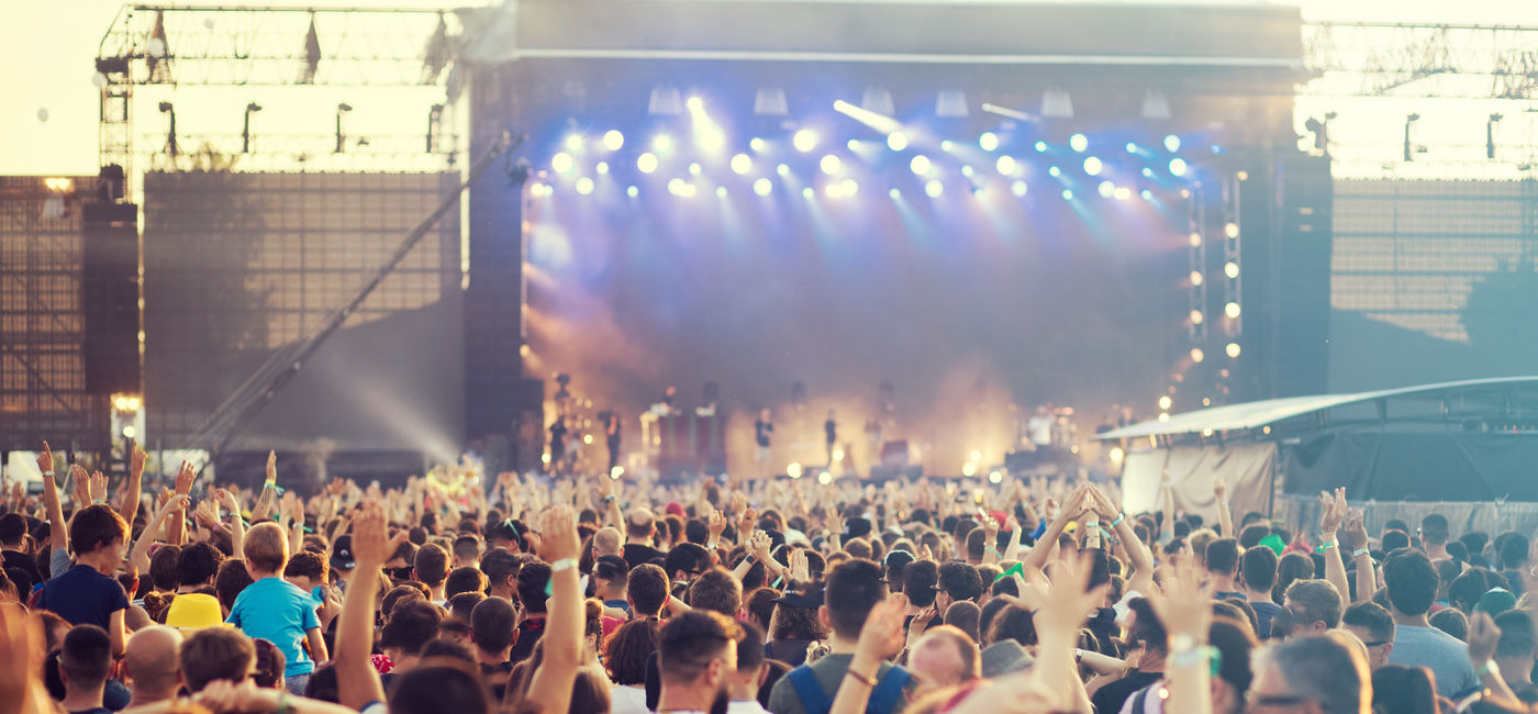 Image: Summer concert crowd. (Photo Credit: 2207918/Adobe)