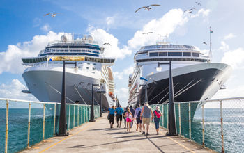Two cruise ships on either side of dock, cruise ships, stock image of cruise ships