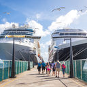 Two cruise ships on either side of dock, cruise ships, stock image of cruise ships