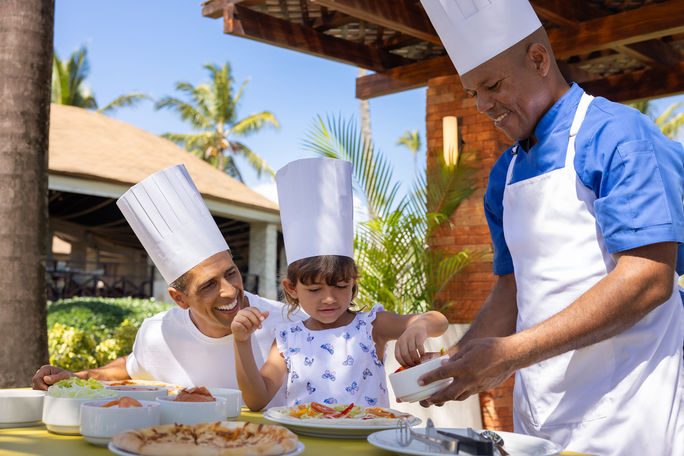 A family takes cooking lessons at Alltra Punta Cana A family takes cooking lessons at Alltra Punta Cana