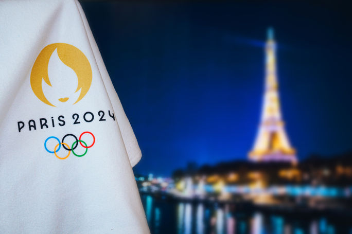 Flag bearing the official logo of the 2024 Paris Summer Olympic Games.