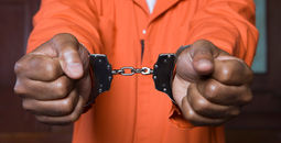 Handcuffed man in courthouse