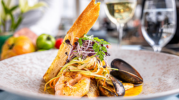Savor seasonal delicacies onboard.