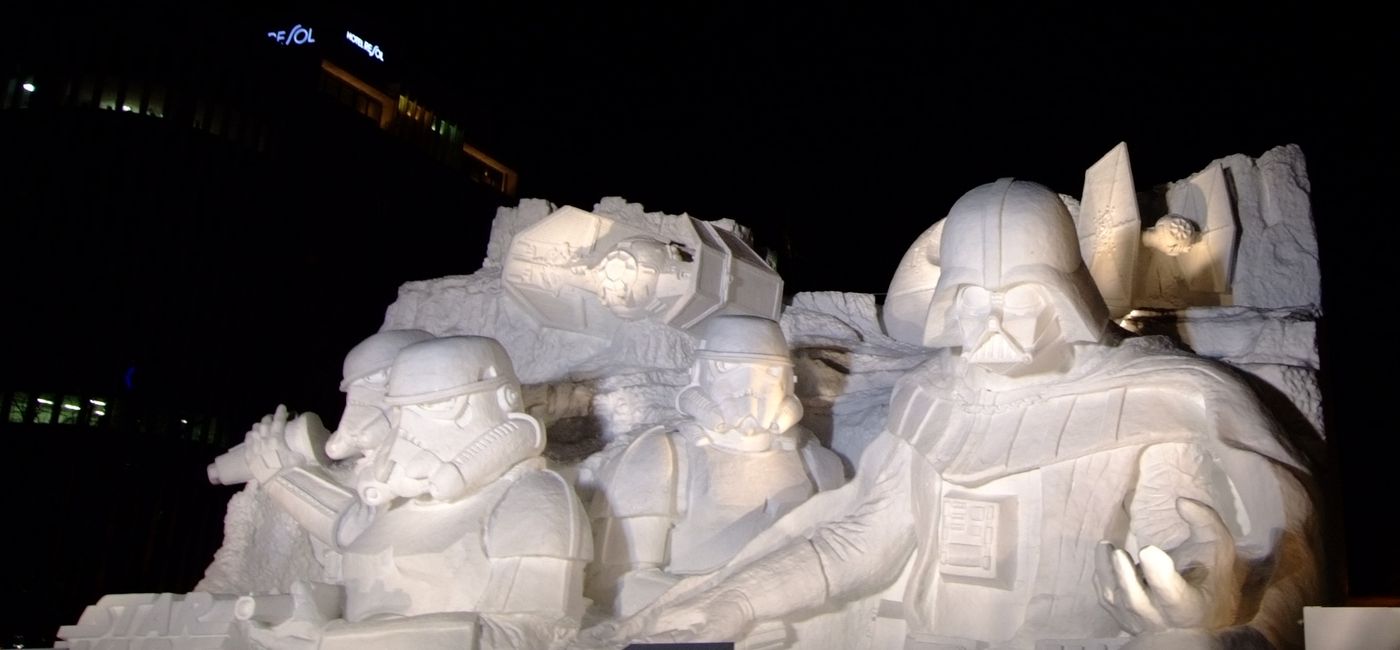 Image: PHOTO: Snow sculpture at the Sapporo Snow Festival (Photo via t-konno / Wikimedia Commons)