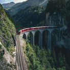 Rail Europe train traveling through the mountains