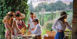 A family enjoying a cooking destination at a European villa.